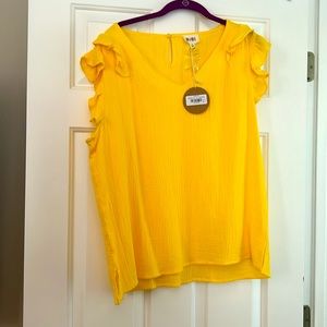 This is a very beautiful top very spring and summer. XL but runs small!